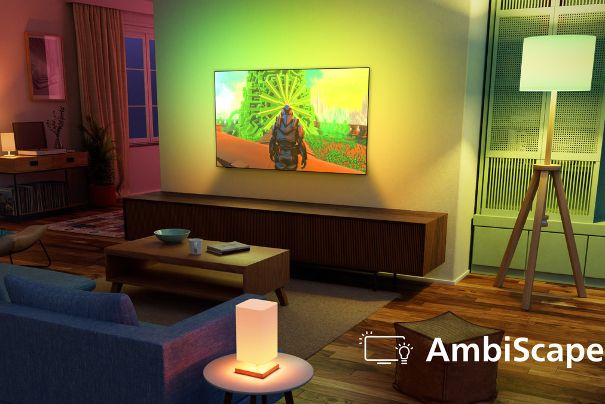 AmbiScape weitet den Ambilight-Effekt in den Raum aus. Bis zu vier smarte Lampen leuchten passend zum Bild und sind in unter einer halben Sekunde synchron. Neu in der Philips-TV-Generation 2026.